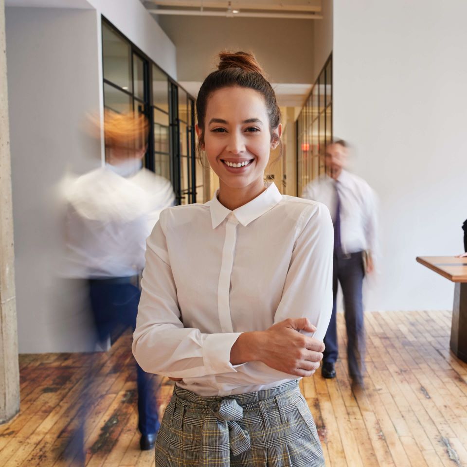 Smiling woman in office